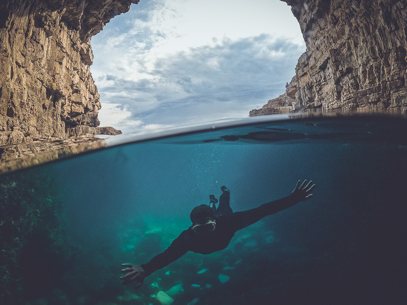Thrilling snorkeling adventure in a sea cave